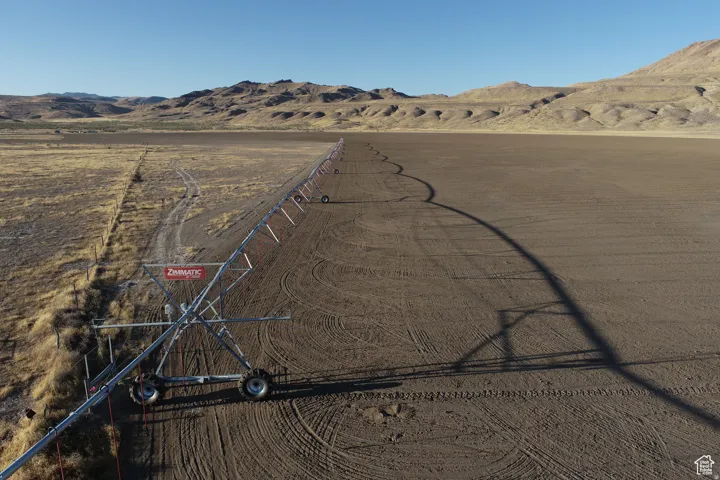 Expansive undeveloped land featuring a ZIMMATIC pivot irrigation system