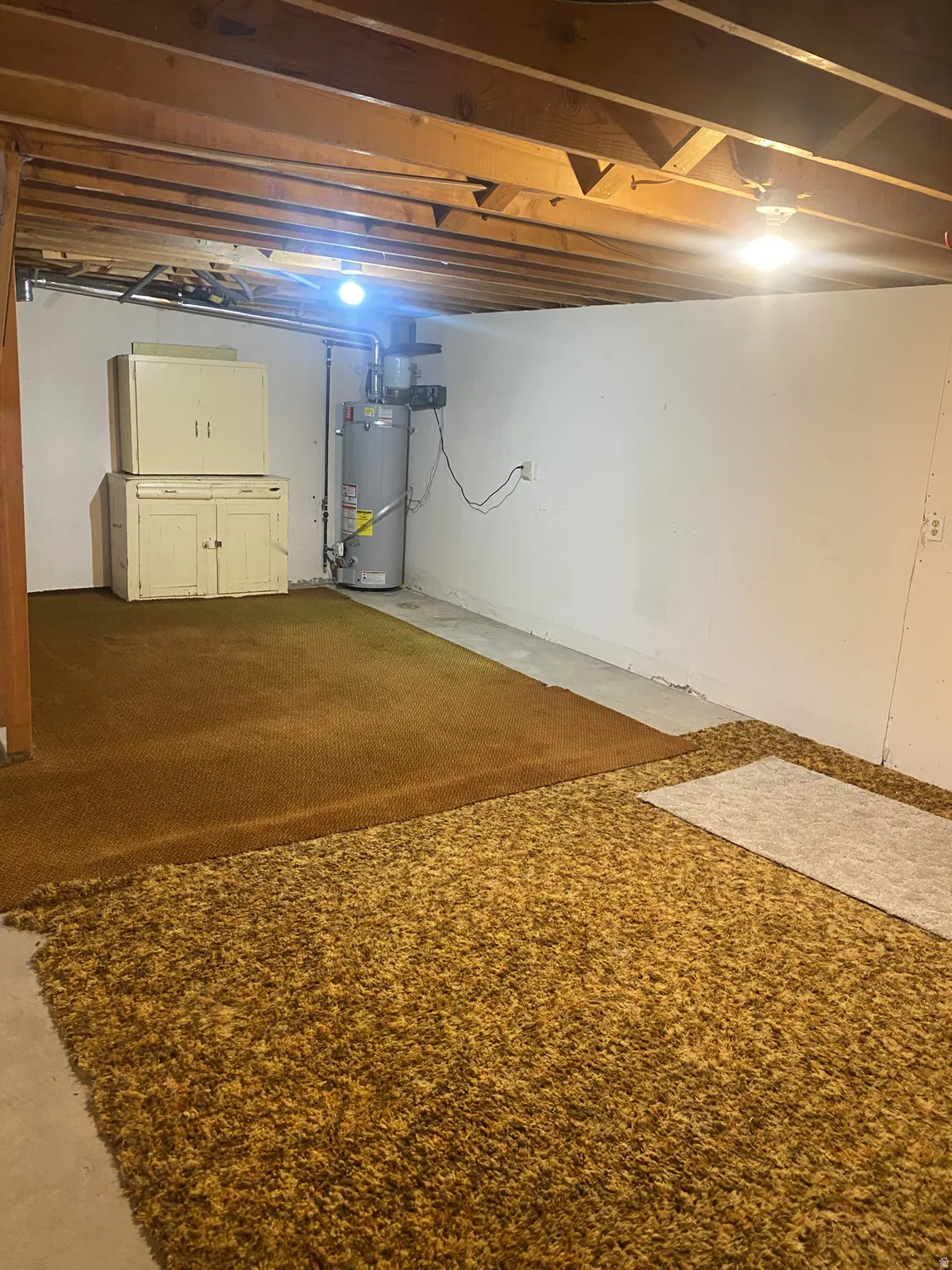 Exposed ceiling joists with visible electrical conduits
