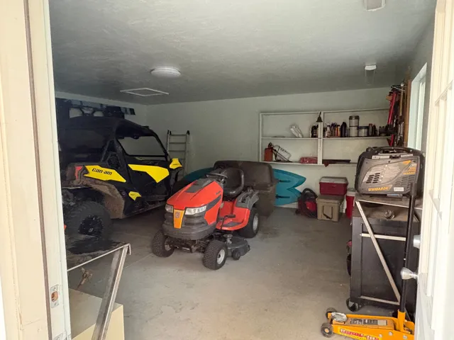 Concrete flooring and built-in shelving