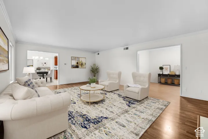 Hardwood-finish flooring, crown molding, and recessed lighting