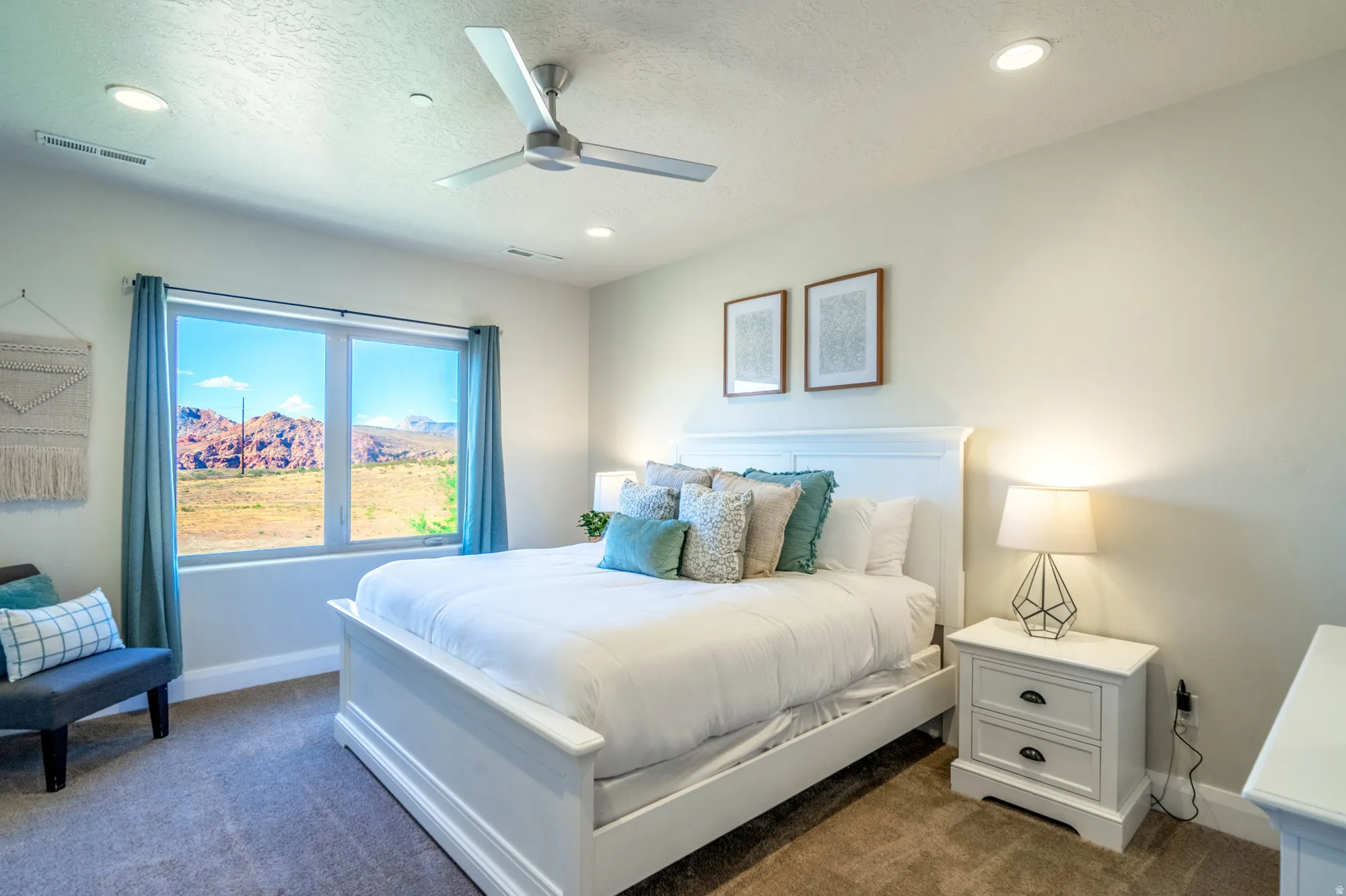 Wall-to-wall carpeting, recessed lighting, and a ceiling fan