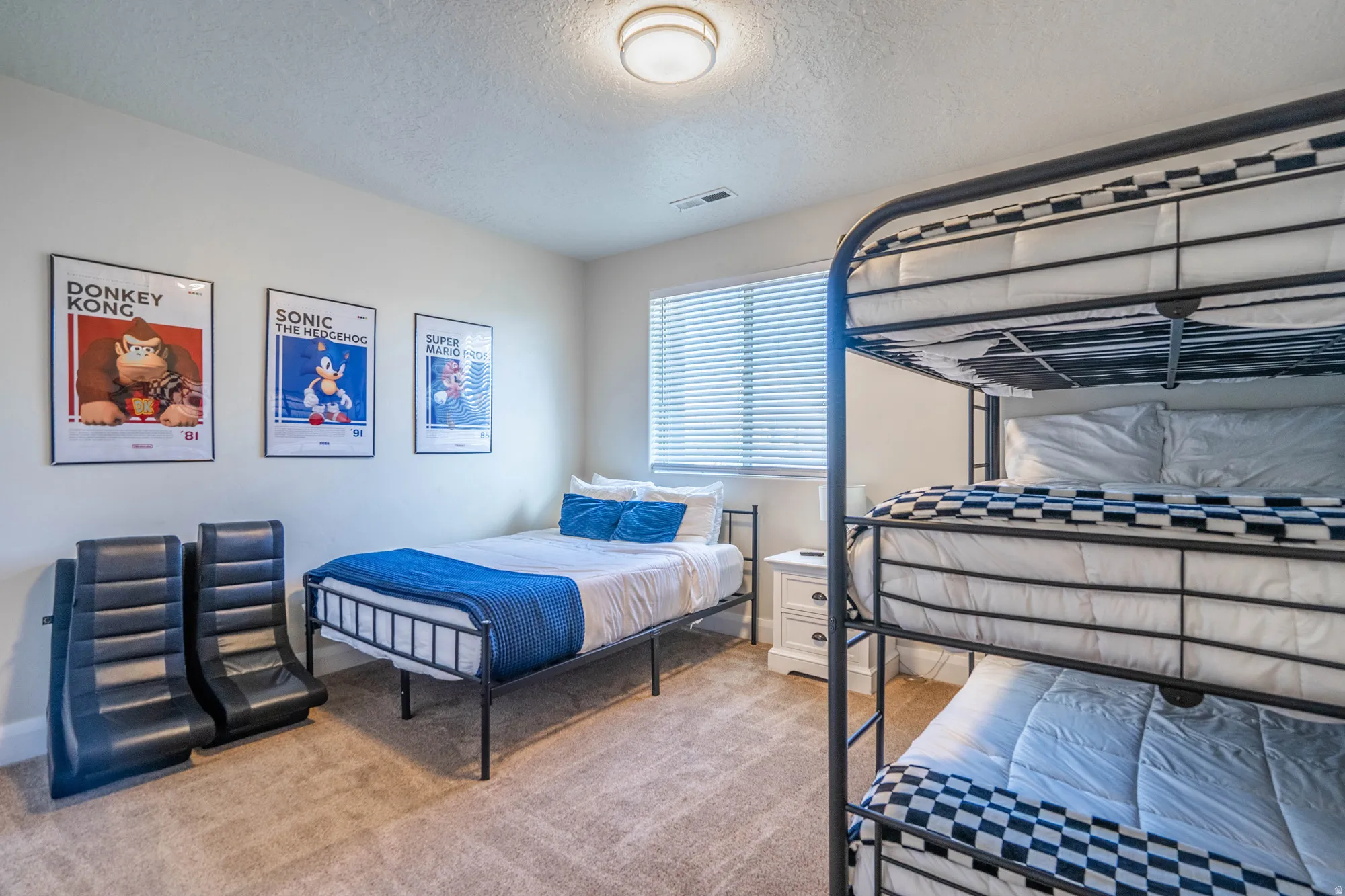 Recessed window with horizontal blinds, carpeted flooring, and a ceiling-mounted light fixture