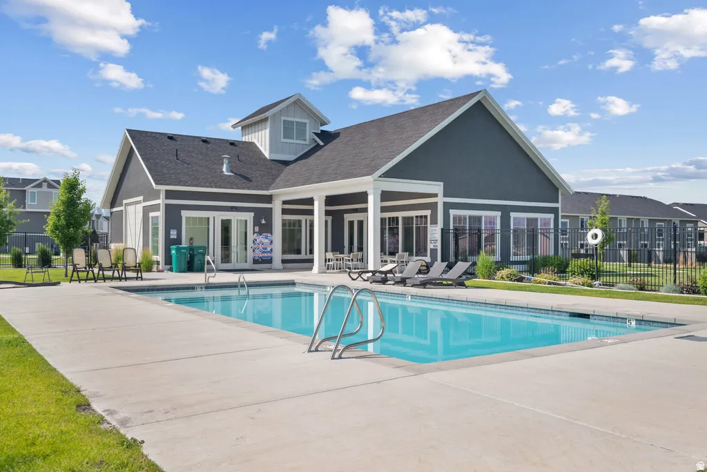 Rectangular swimming pool with concrete surround