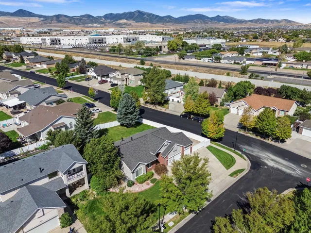 Neighborhood setting with paved streets and mature trees