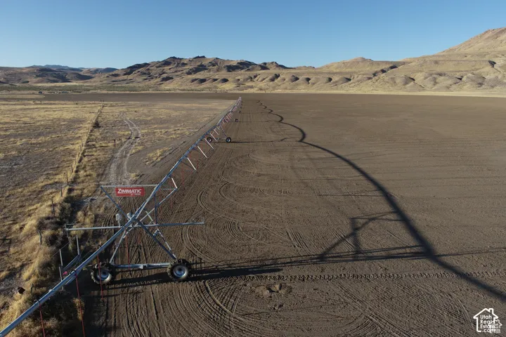 Expansive undeveloped land featuring a ZIMMATIC pivot irrigation system