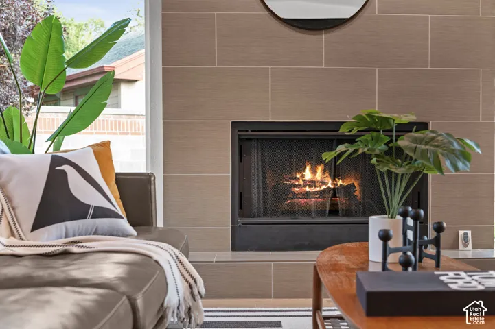 Built-in fireplace with a tile surround and hearth