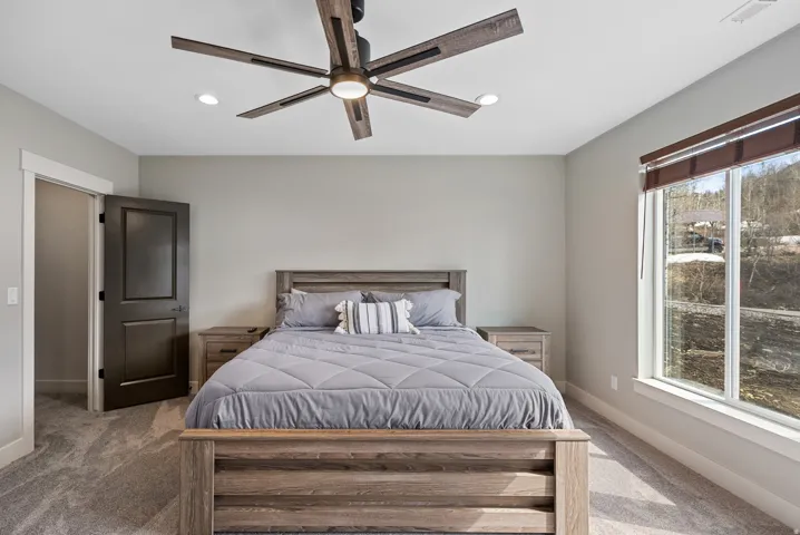 Wood-finish ceiling fan with integrated lighting