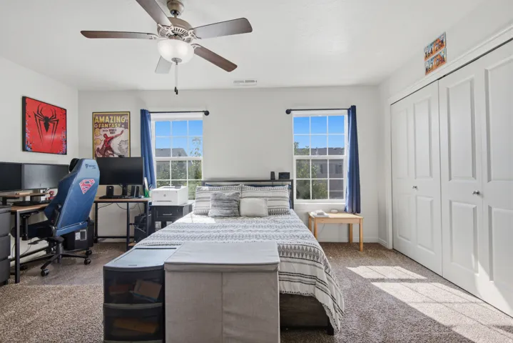 White walls with textured carpet flooring