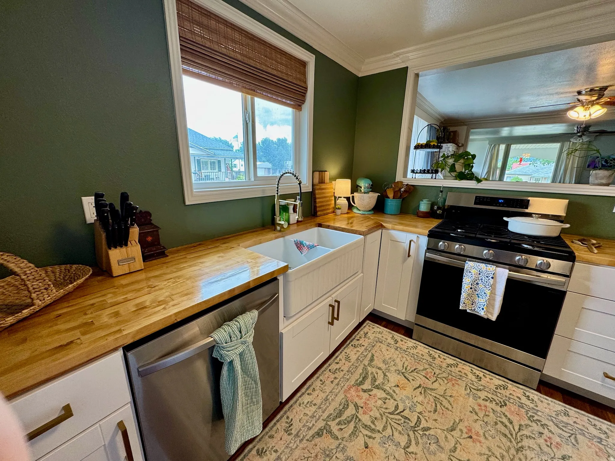 Wood-finish countertops with an undermount farmhouse sink