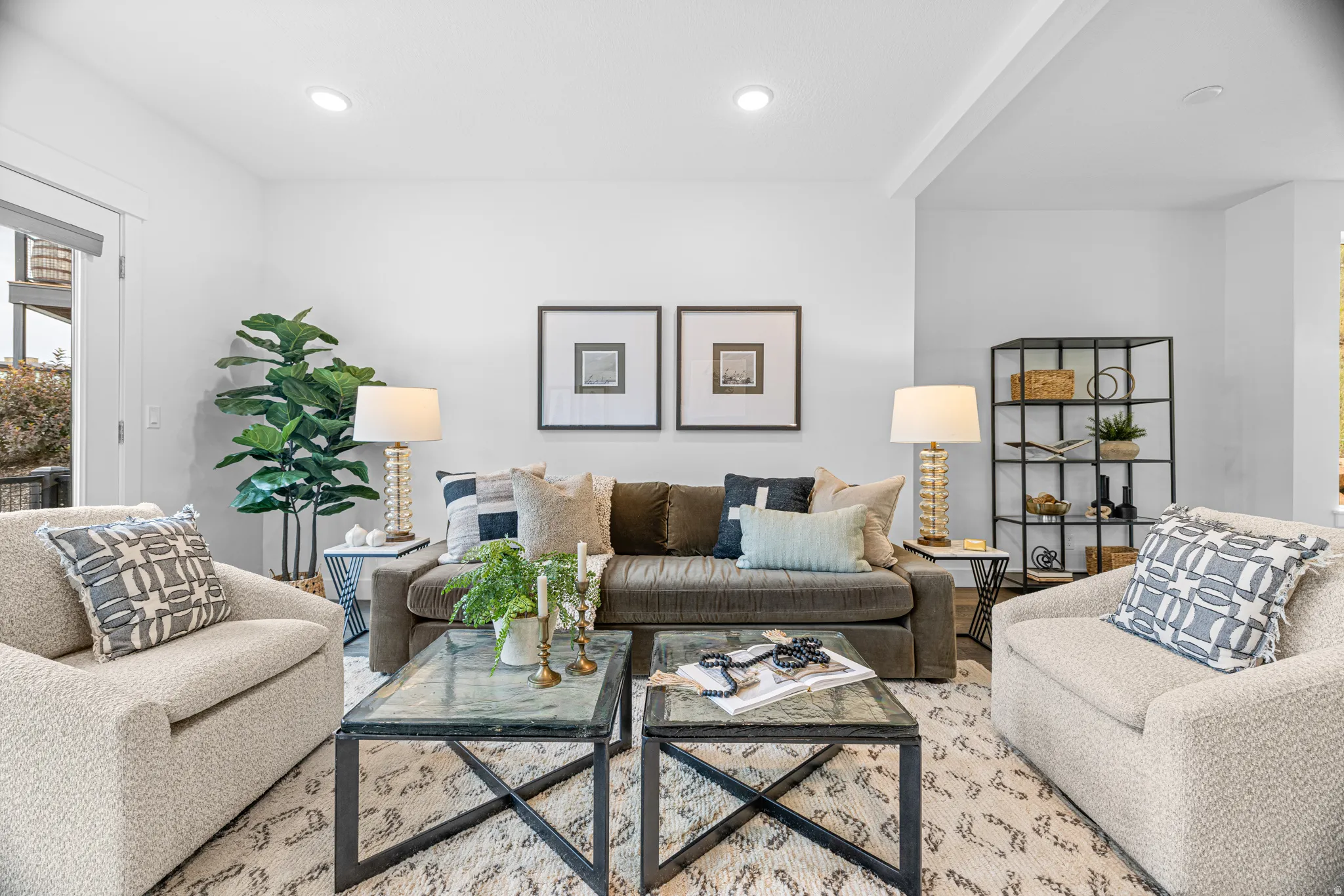 Recessed lighting and a light-toned ceiling