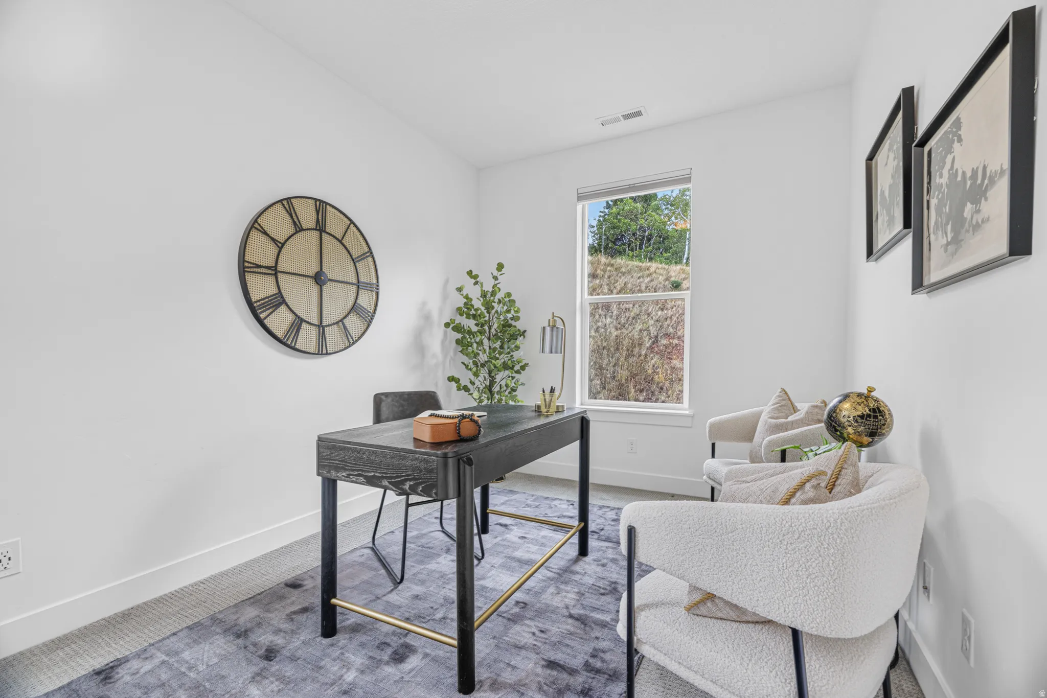 Recessed lighting and a dedicated window provide natural light