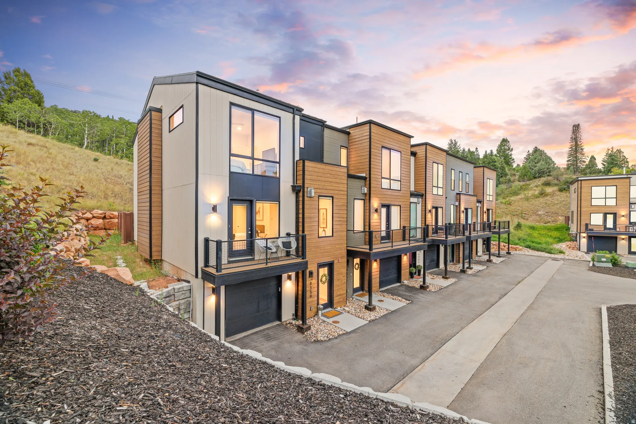 Contemporary architectural design with mixed material siding and black trim accents