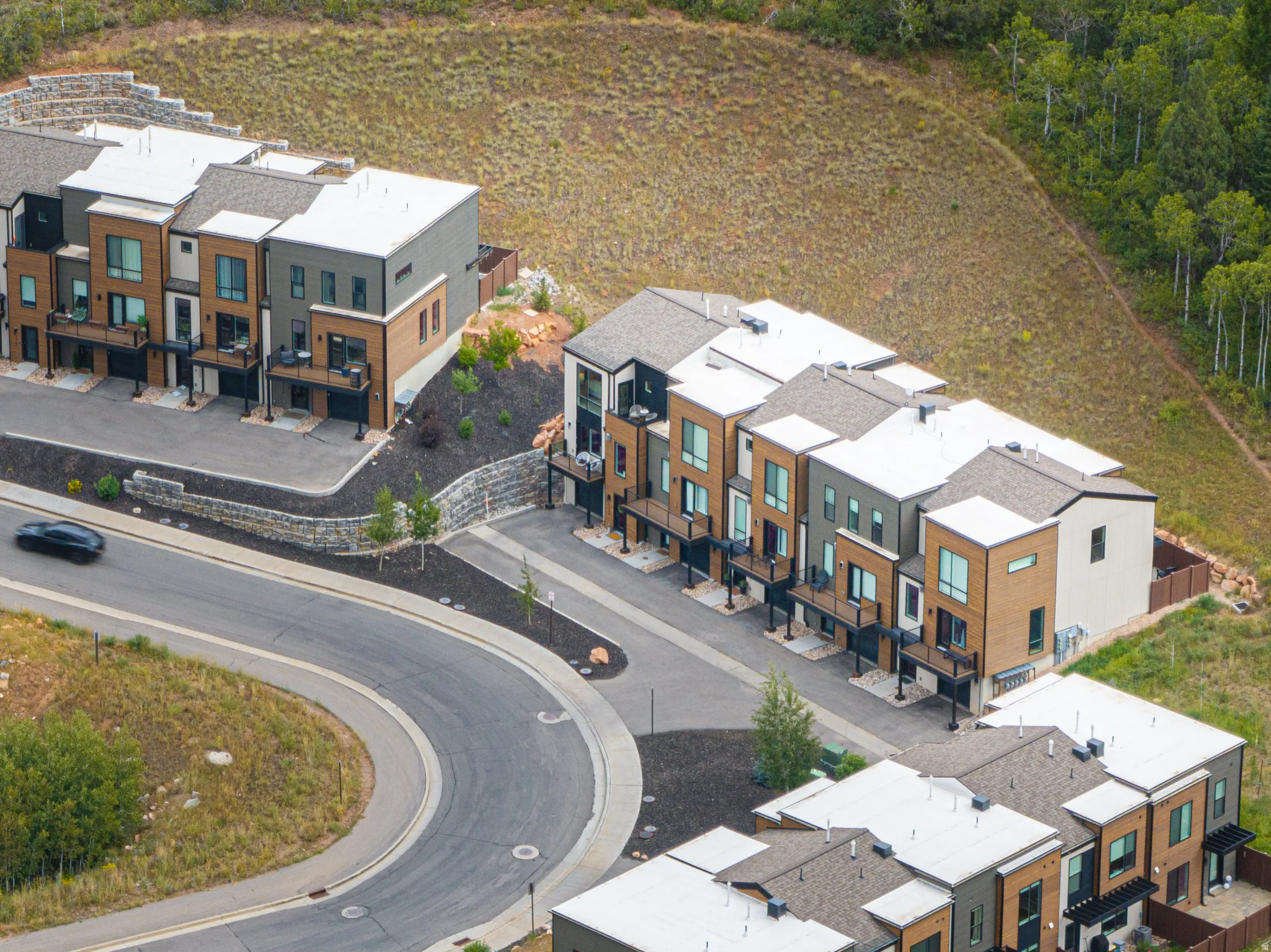 Modern townhomes featuring multi-tone facades and private balconies