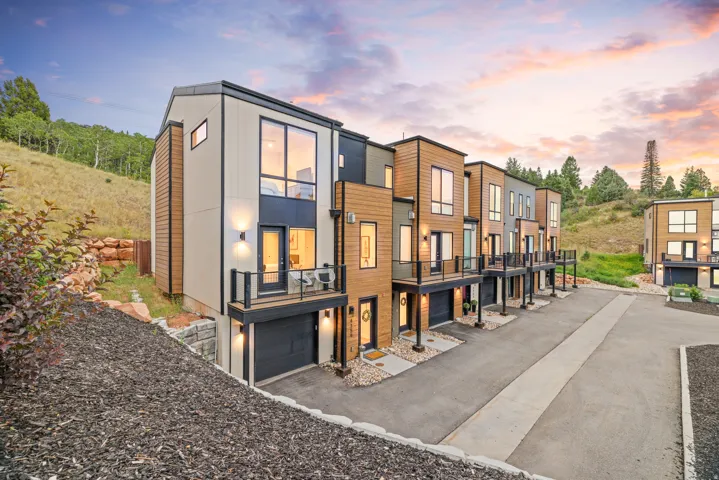 Contemporary architectural design with mixed material siding and black trim accents