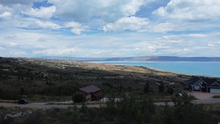 Expansive body of water with distant landforms