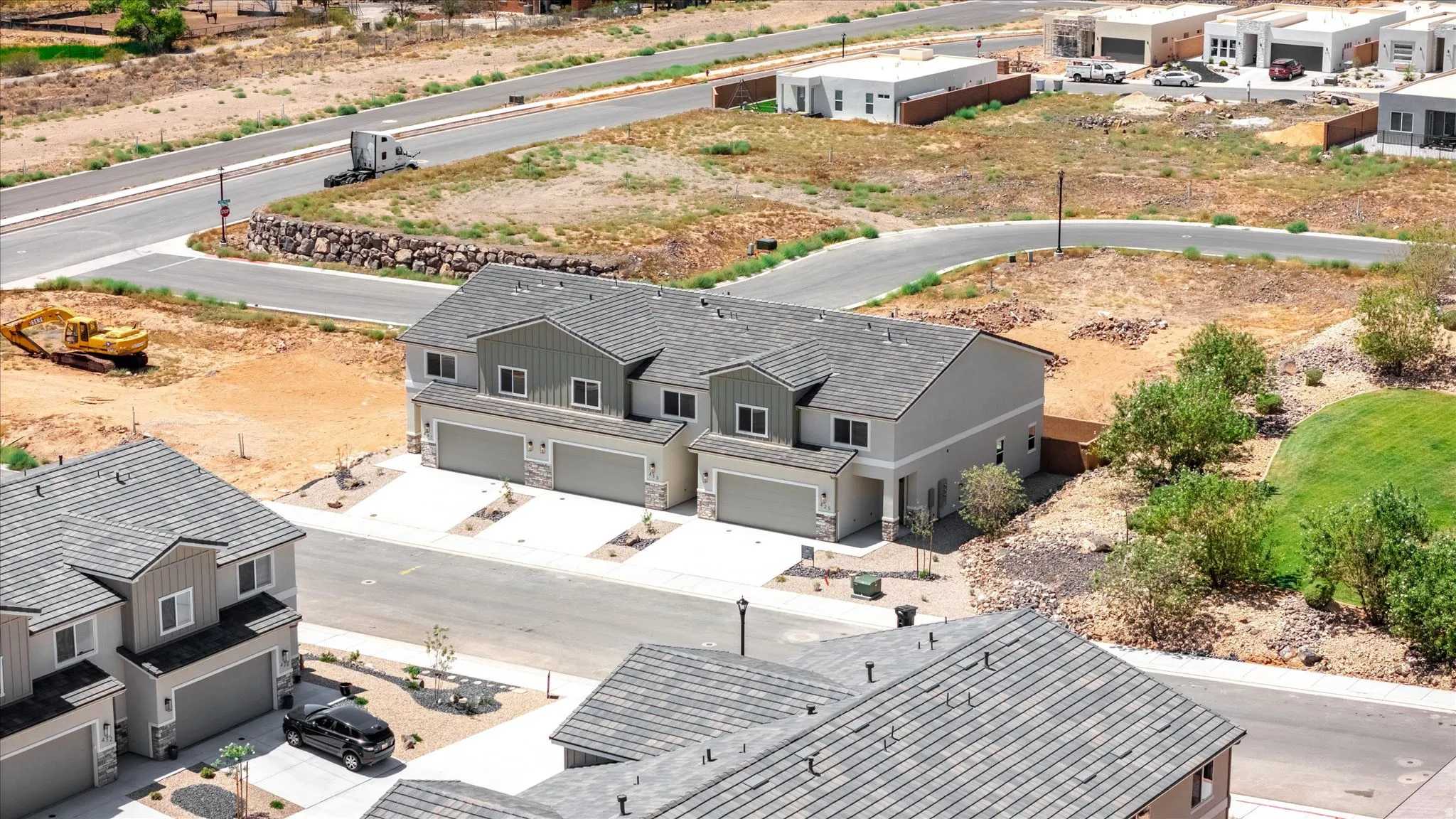 Modern multi-story residential structures with attached garages