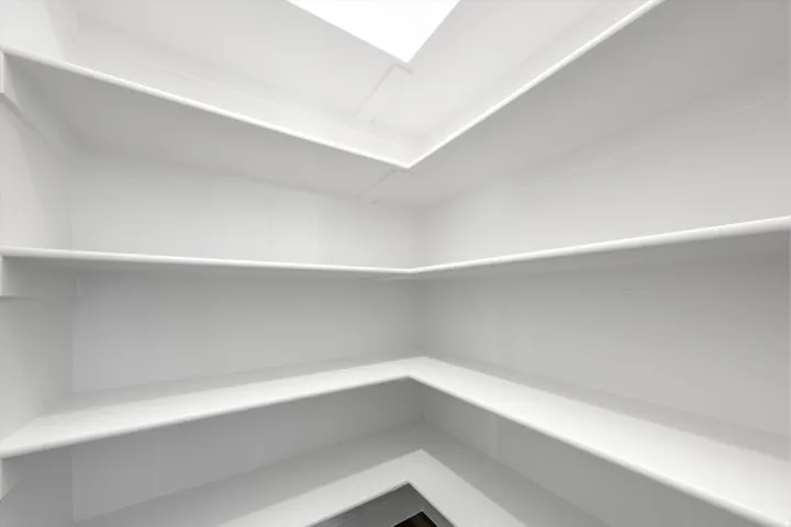 Skylight illuminating extensive built-in shelving