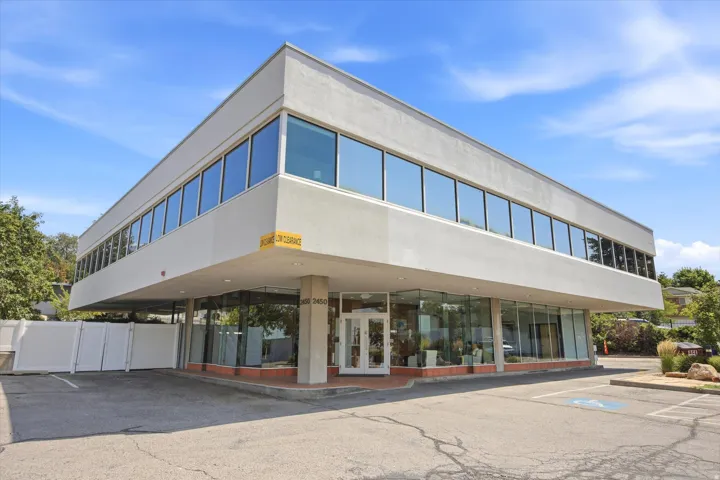 Modern commercial building featuring a flat roof and stucco exterior
