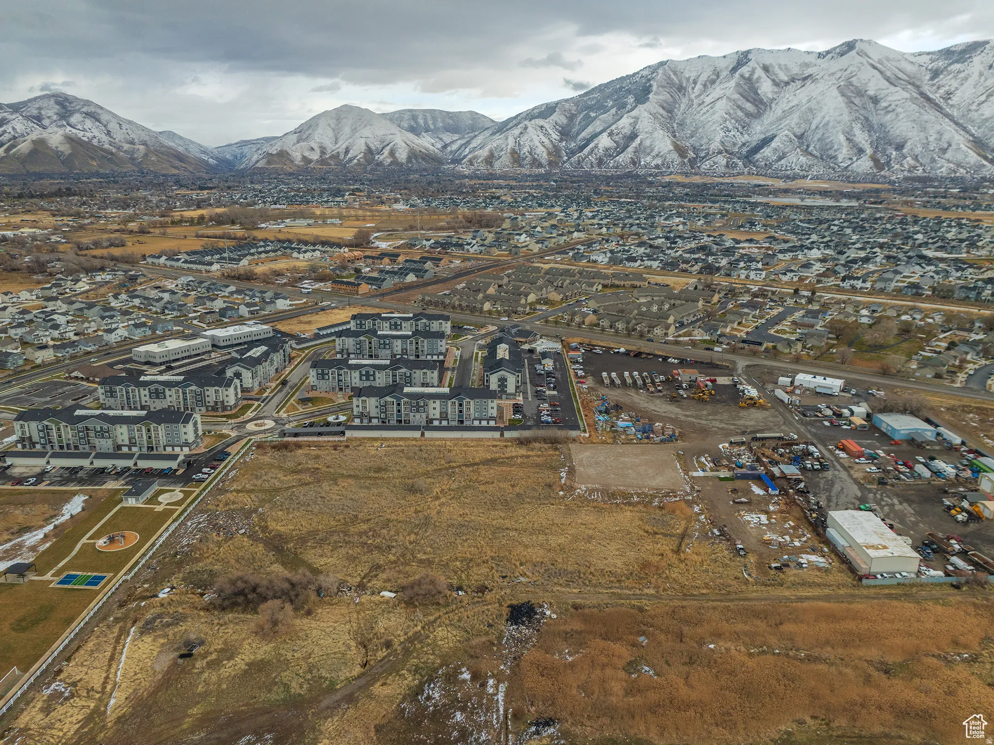 Expansive property with a mountainous backdrop