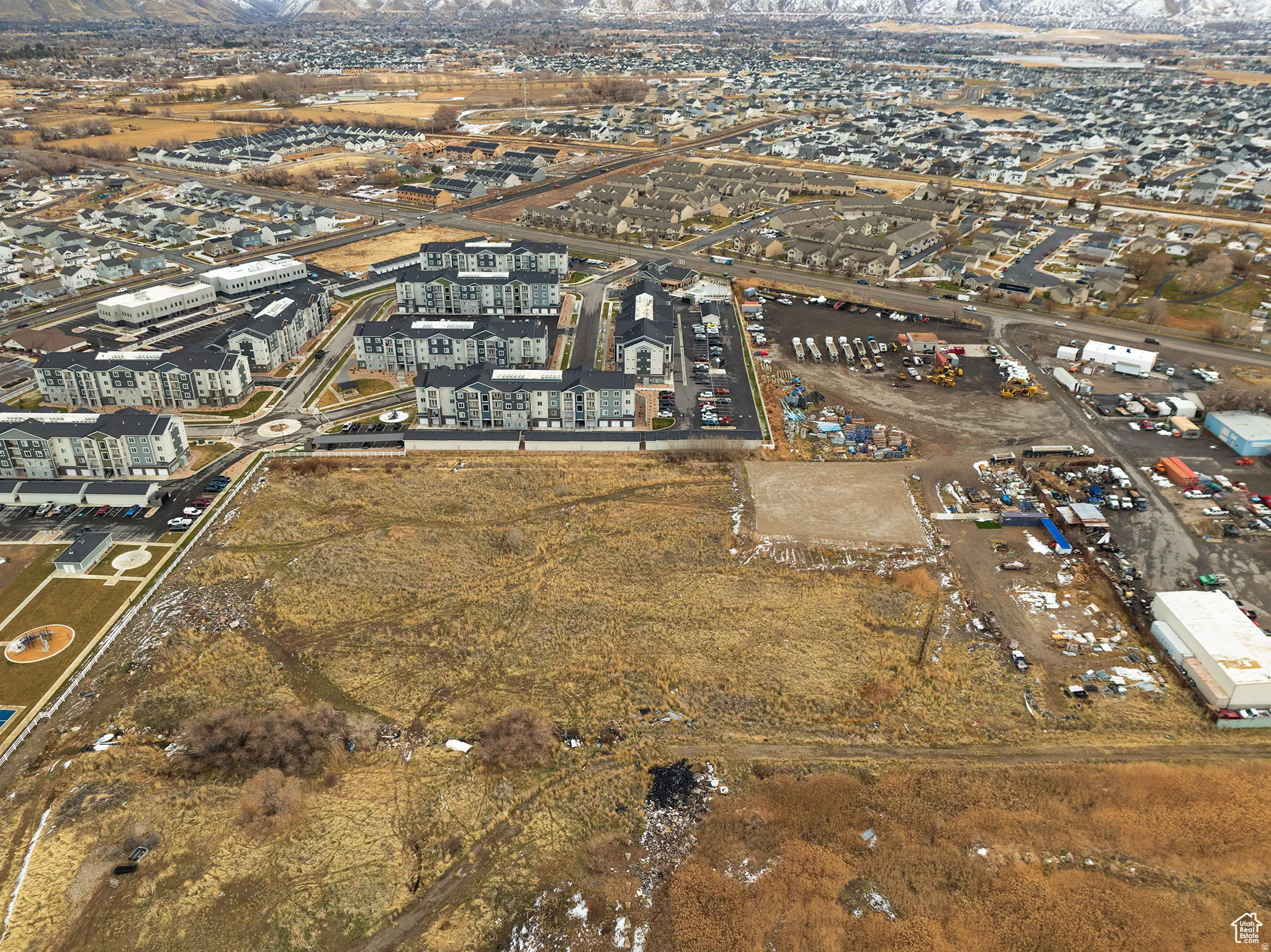 Expansive land parcel with surrounding residential developments