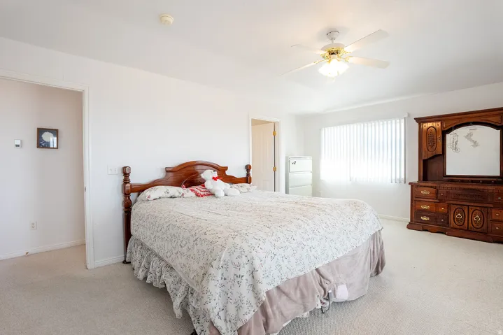 White walls with light-toned carpeting
