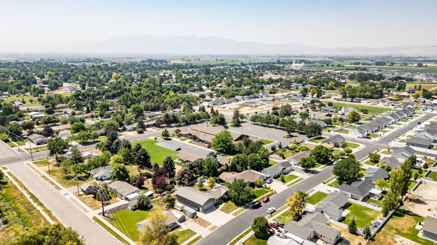 Residential neighborhood with mature trees and paved streets