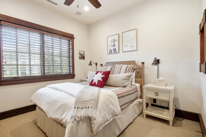 Built-in ceiling fan, recessed lighting, and wall-mounted sconces