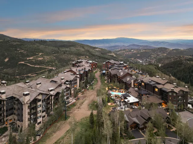 Expansive mountain landscape with multiple multi-story structures