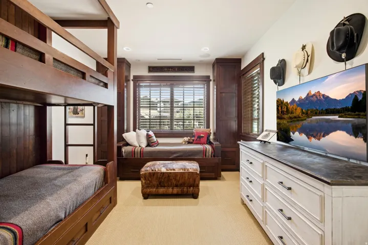 Custom built-in bunk beds and daybed with integrated storage