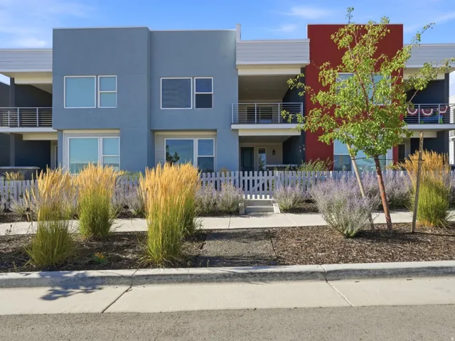 Contemporary multi-level exterior with stucco finish and a contrasting color palette