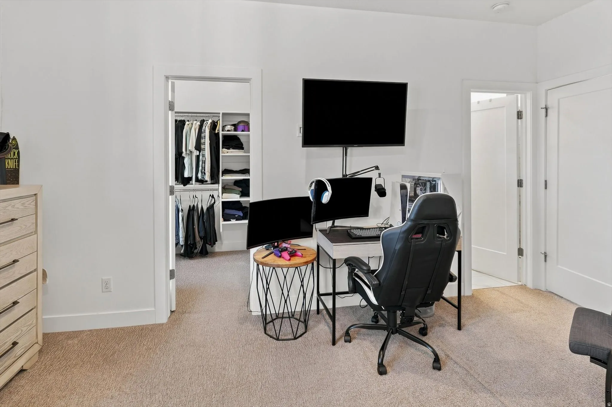White walls with carpeted flooring