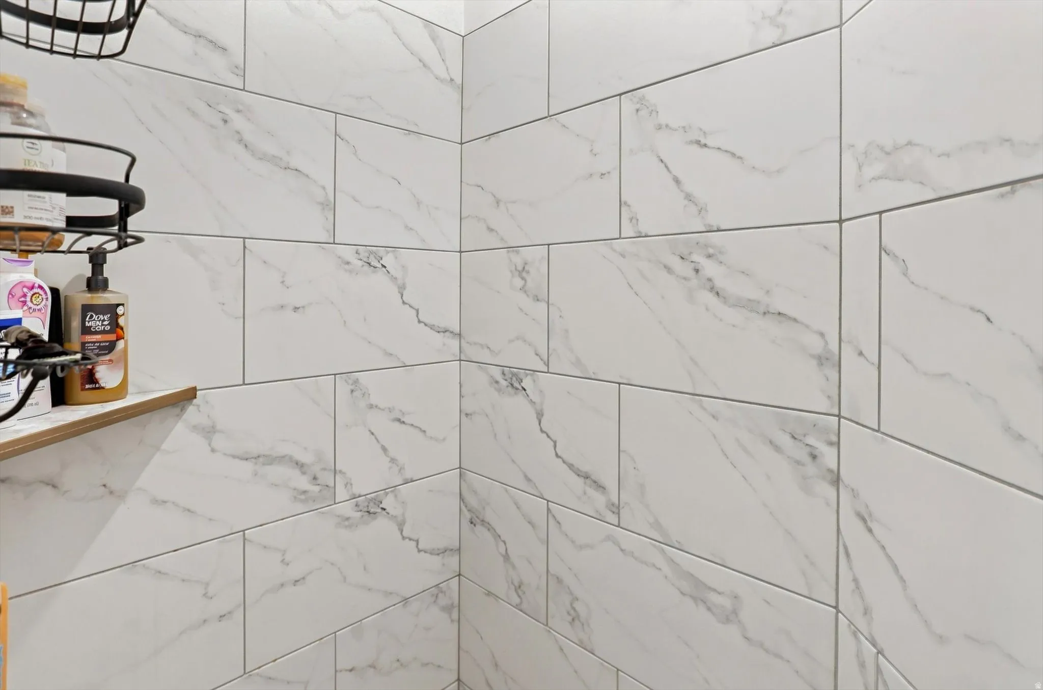 White rectangular wall tile with gray veining