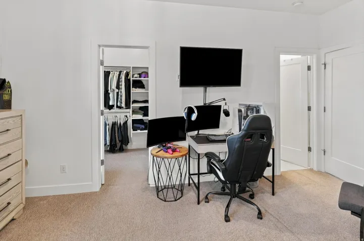 White walls with carpeted flooring