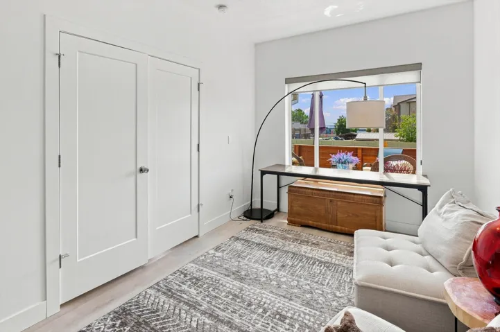 Neutral wall tones with light wood-finish flooring