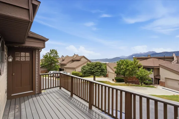 Spacious outdoor deck with mountain scenery