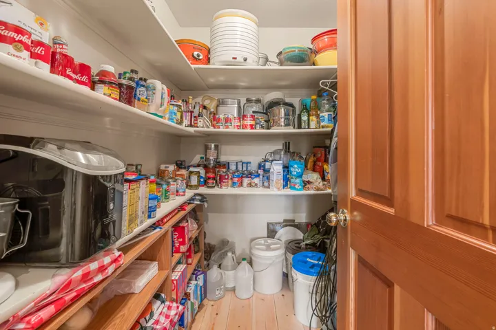 Built-in shelving with wood-finish flooring