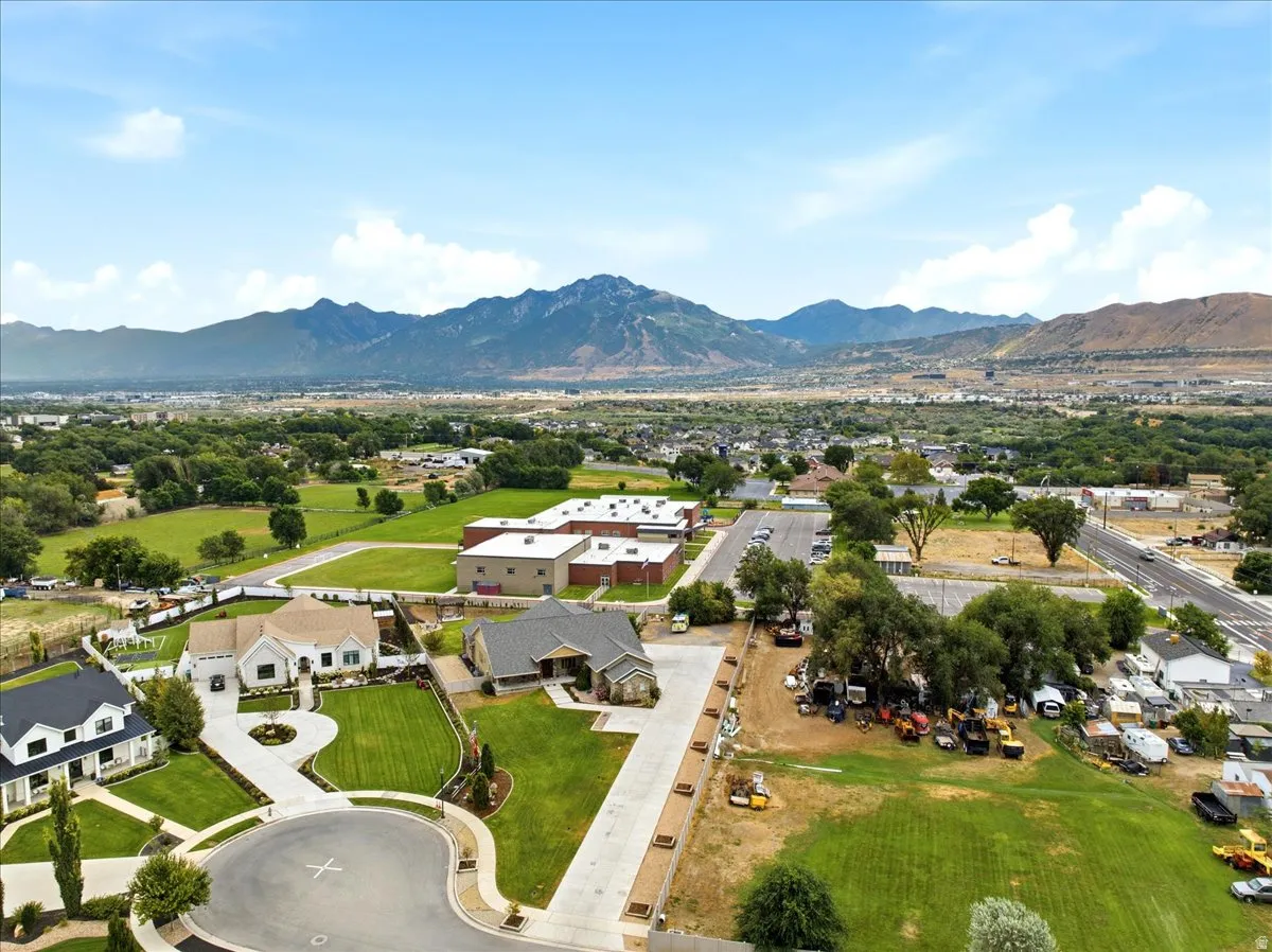 Expansive mountain backdrop with a residential neighborhood