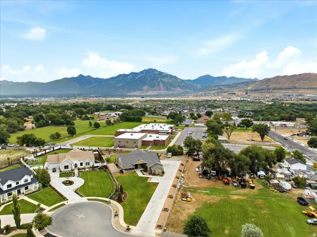 Expansive mountain backdrop with a residential neighborhood
