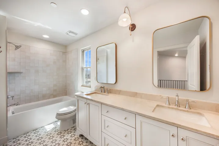 Dual vanity with integrated sinks and stone countertop