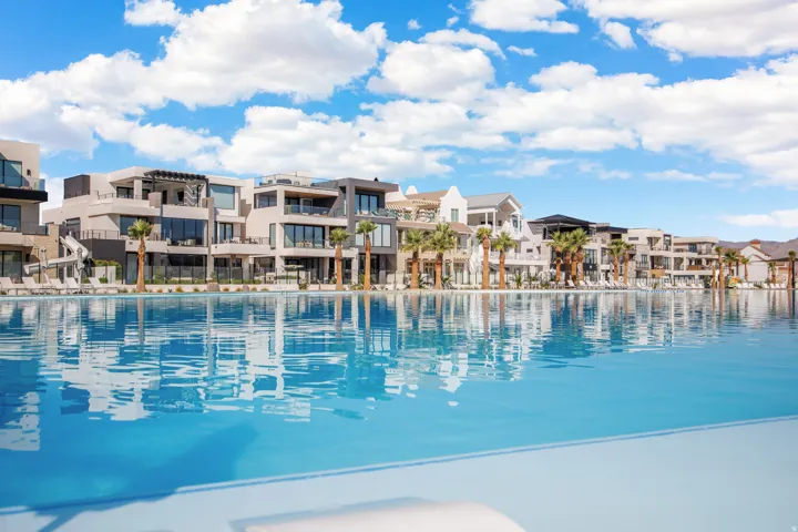 Expansive outdoor pool with a reflective surface
