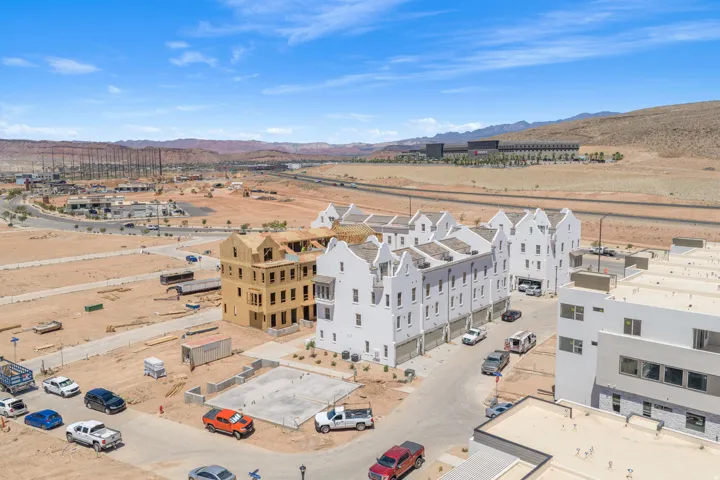 Newly constructed multi-story residences with white facades