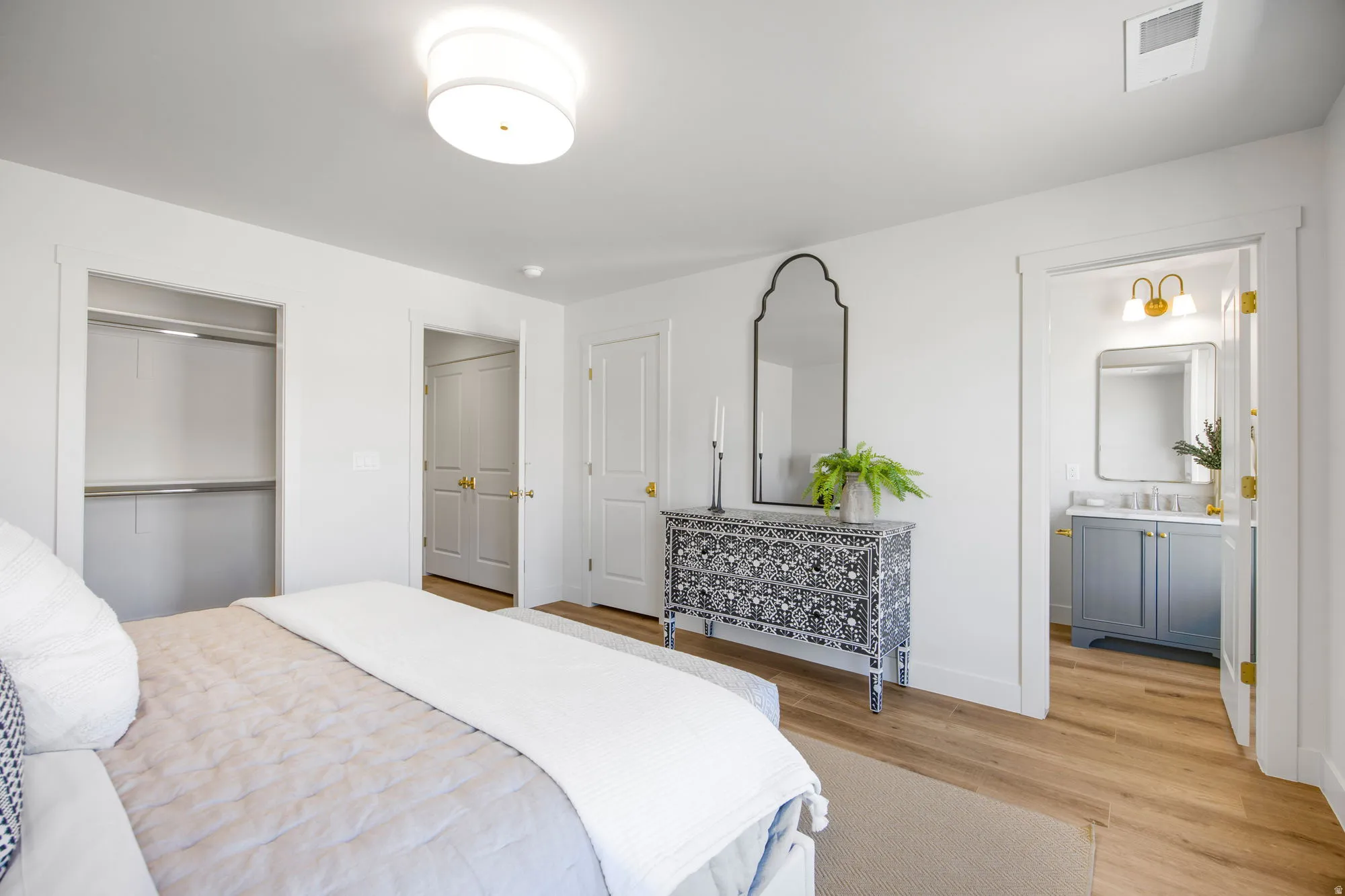 Wood-finish flooring with white walls