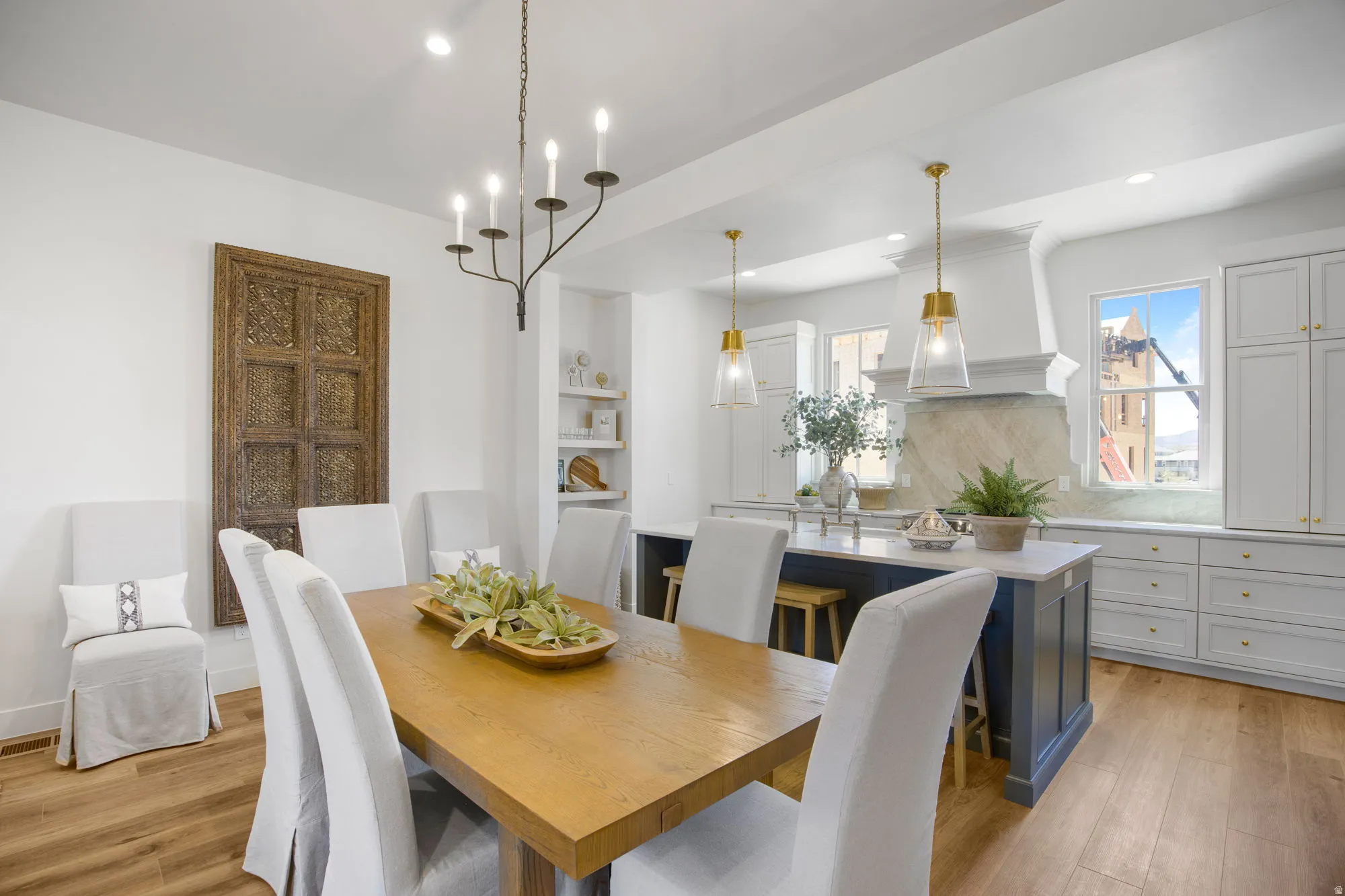 Hardwood-style flooring extends through the dining area and kitchen
