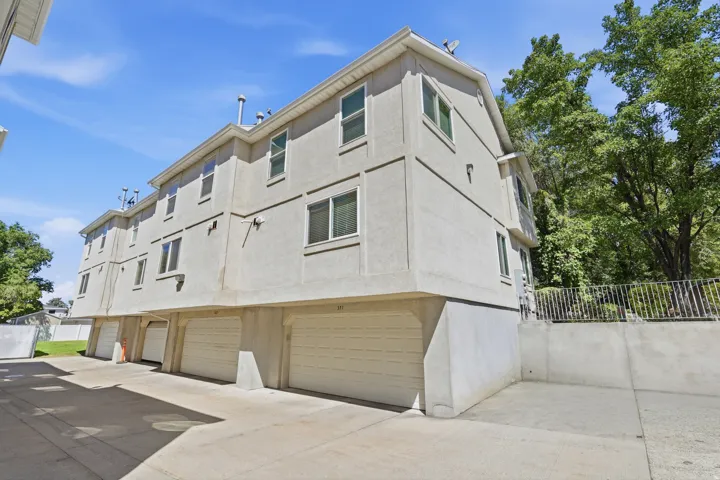 Multi-story structure with a textured stucco exterior