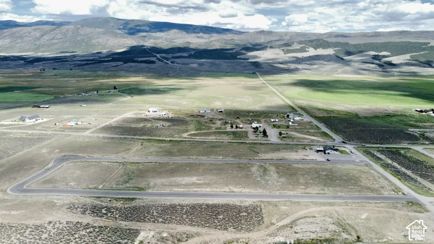 Expansive rural landscape with distant mountains