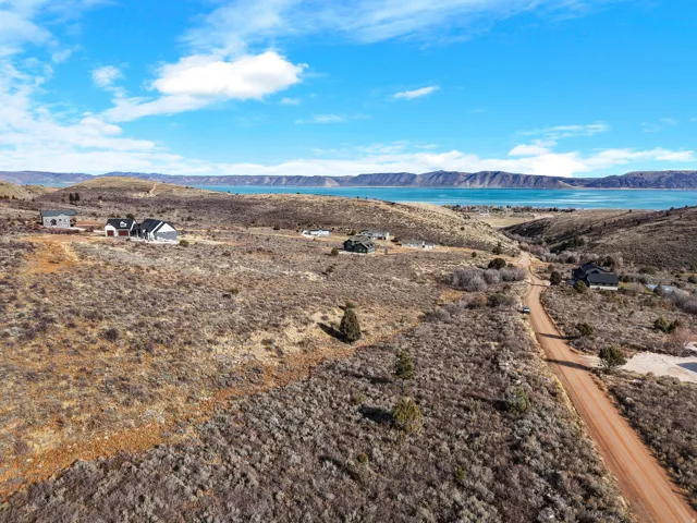 Rolling terrain with scattered low-lying vegetation