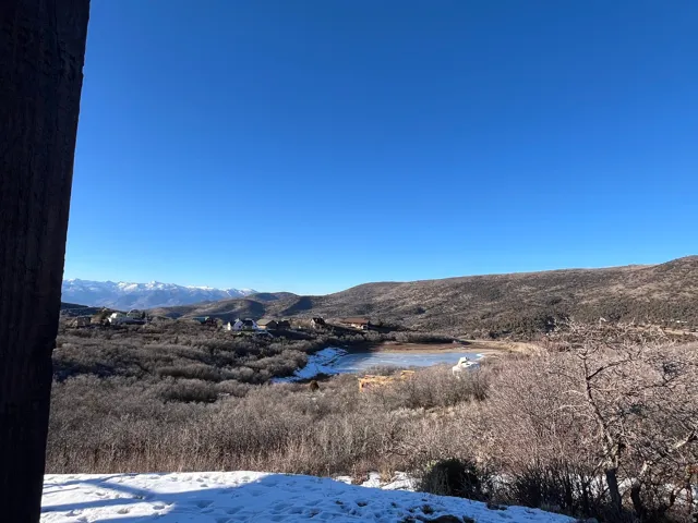 Mountainous terrain with distant snow-capped peaks