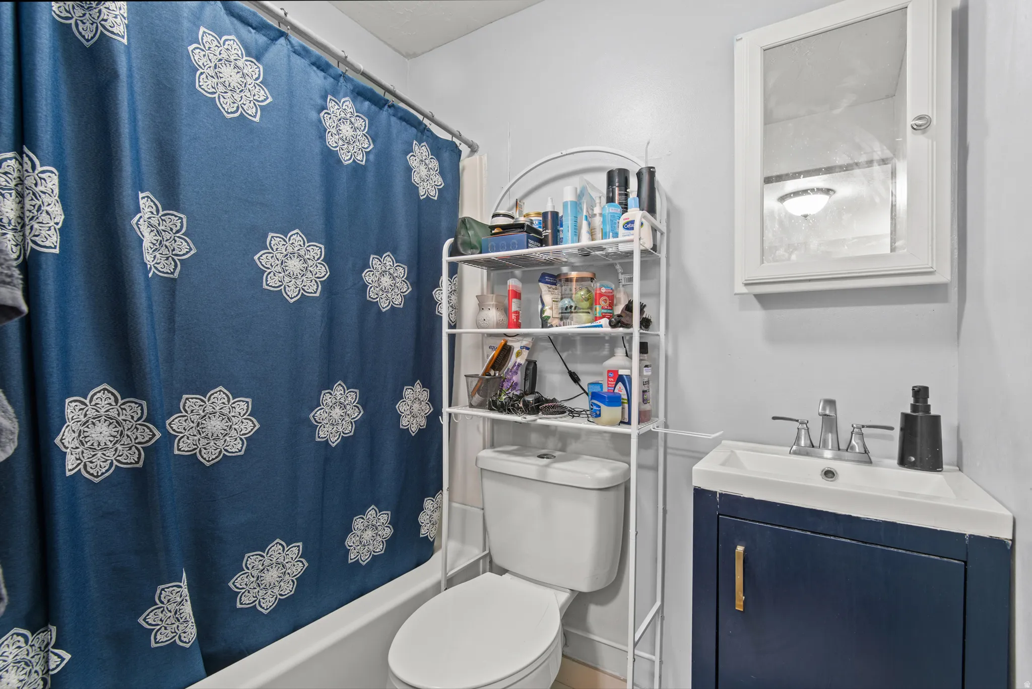 White bathtub with an integrated shower