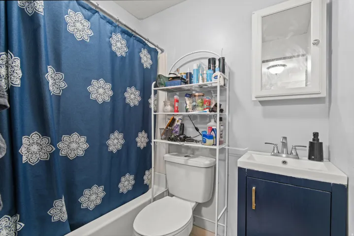 White bathtub with an integrated shower