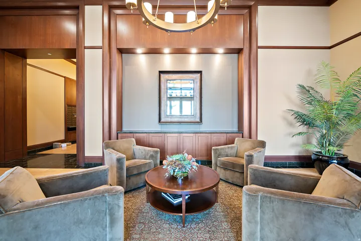 Wood-paneled walls and trim with recessed lighting